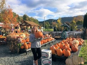 Madison chooses a plump pumpkin for carving for Halloween! Click to Enlarge.